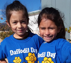 Two happy Minnie Cannon students on Daffodil Day.